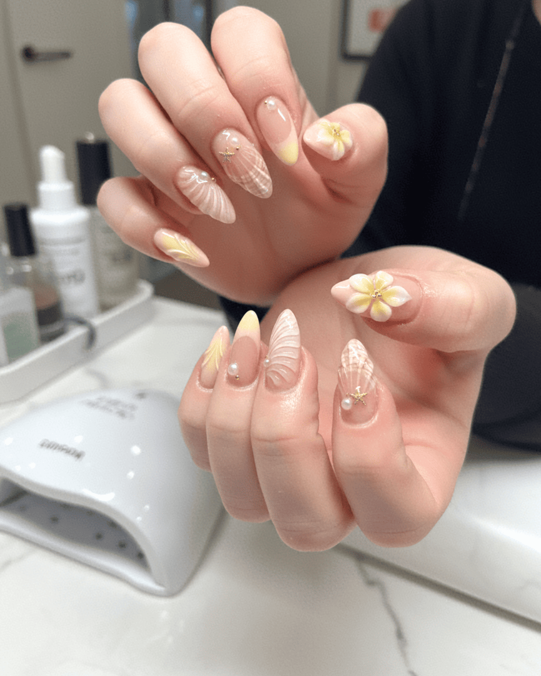 Inside Queen Nails Dartmouth NS â nail technician at work showing professional manicure with bio gel nail art